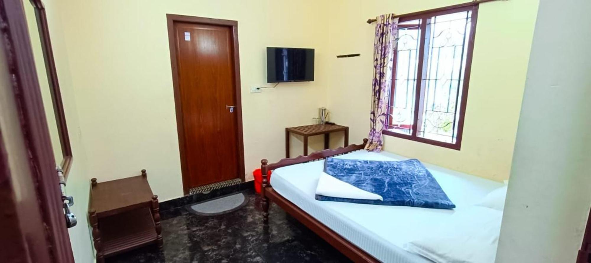 Swarna Tourist Home Муннар Экстерьер фото