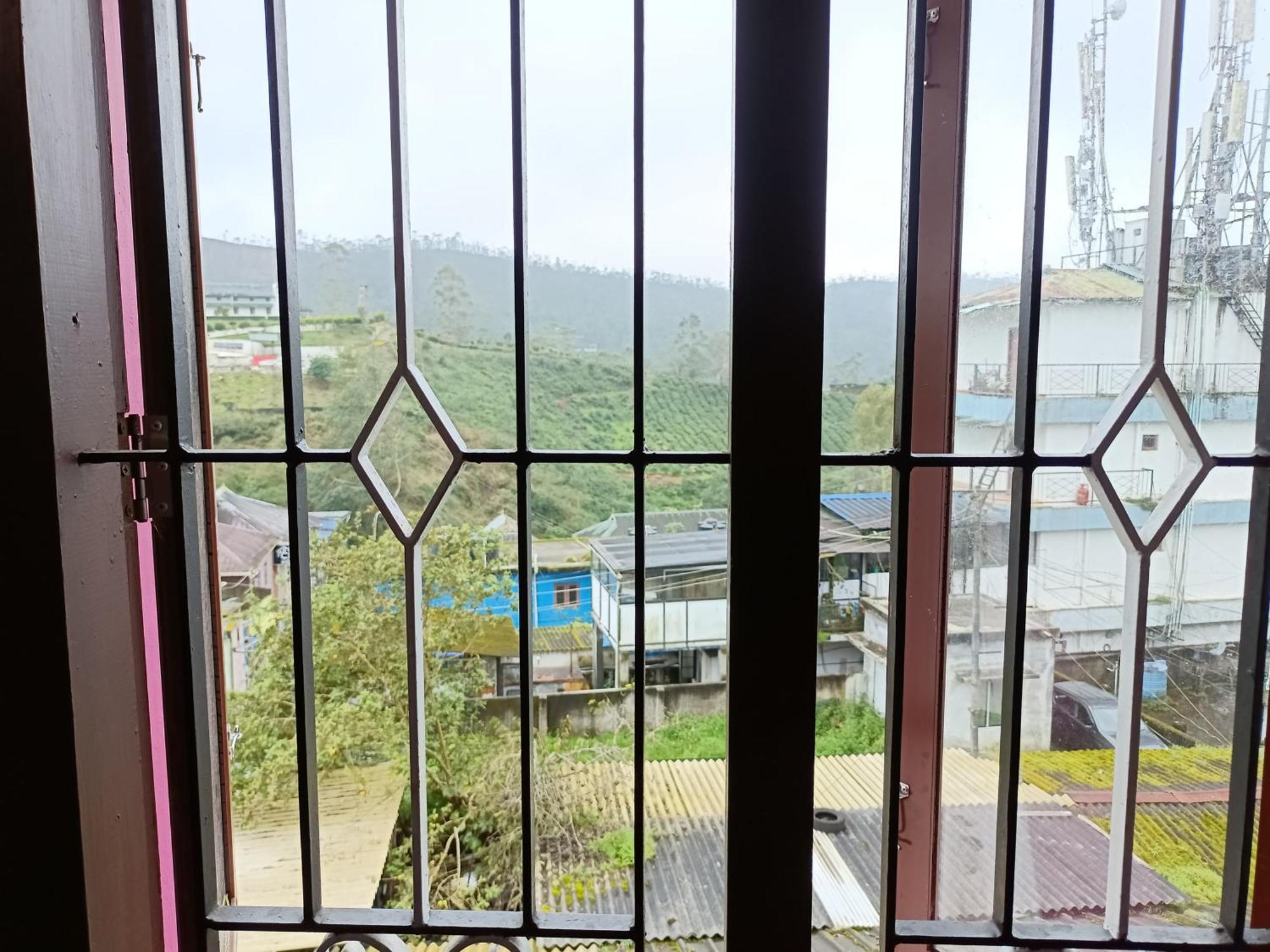Swarna Tourist Home Муннар Экстерьер фото